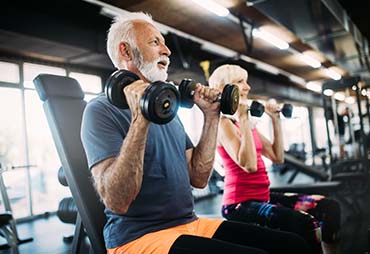 Couple exercising together to relieve neuropathic symptoms