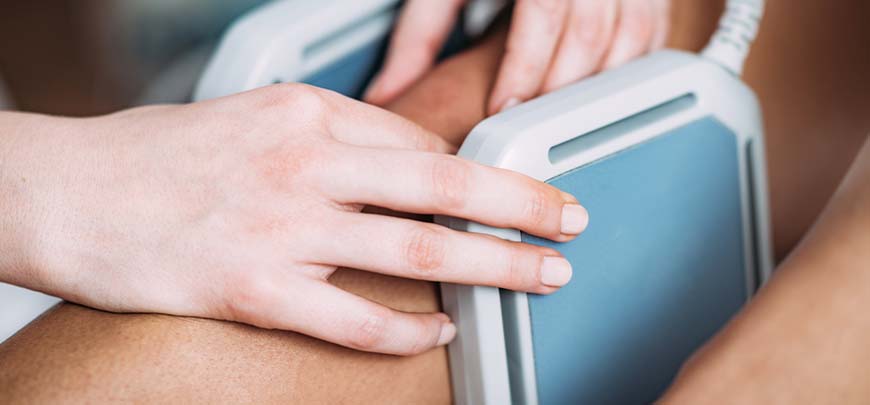 Man receiving PEMF therapy as part of the neuropathy treatment protocol at South Bay Wellness Center in San Jose  