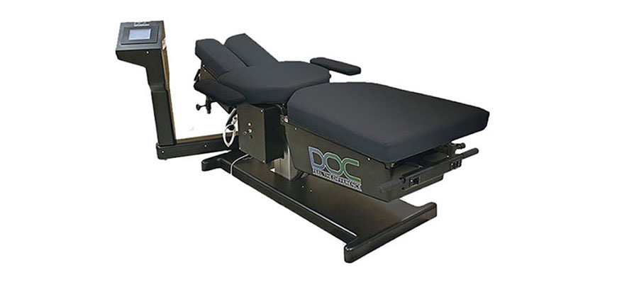 Patient receiving spinal decompression therapy as part of her neuropathy treatment protocol